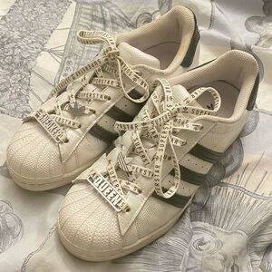 Adidas purple and white superstar size 6.5 women's sneakers. Shell toe